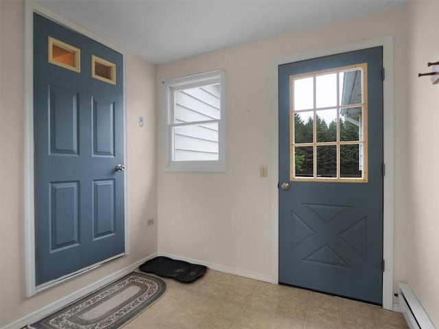 3343 Cory Hill Rd, Marion, NY 14505 - entrance foyer with a baseboard radiator and baseboards