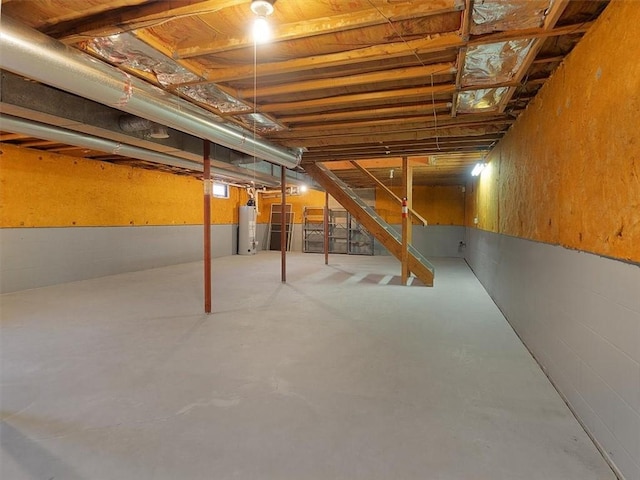 3343 Cory Hill Rd, Marion, NY 14505 - unfinished below grade area featuring gas water heater and stairway