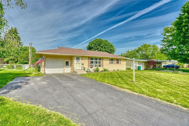 39 Ingram Dr, Gates, NY 14624 - single story home featuring an attached garage and asphalt driveway