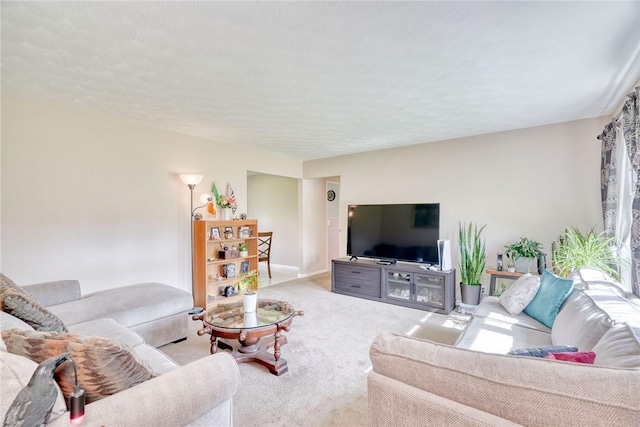 39 Ingram Dr, Gates, NY 14624 - carpeted living area with baseboards