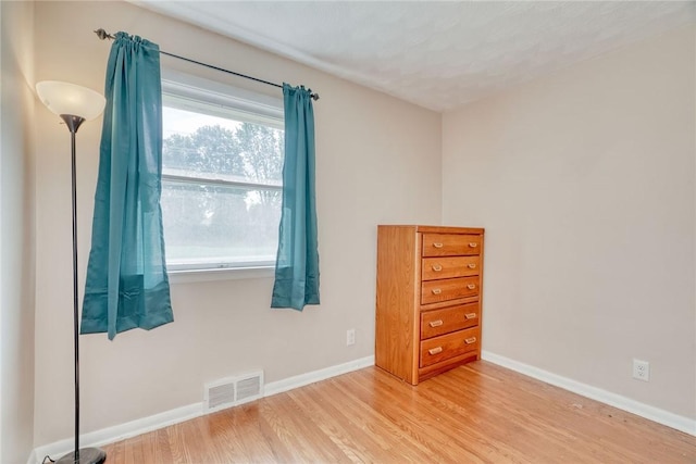 39 Ingram Dr, Gates, NY 14624 - unfurnished room featuring wood finished floors and baseboards