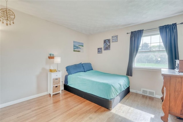 39 Ingram Dr, Gates, NY 14624 - bedroom featuring wood finished floors and baseboards