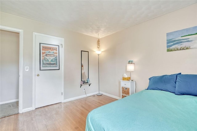 39 Ingram Dr, Gates, NY 14624 - bedroom featuring light wood-type flooring and baseboards