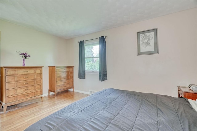39 Ingram Dr, Gates, NY 14624 - bedroom with light wood-type flooring and baseboards