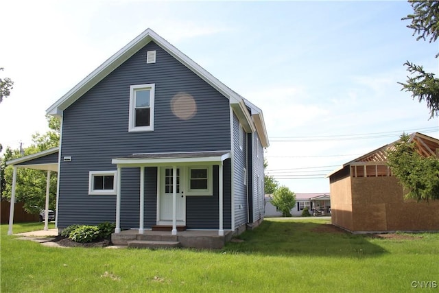 8766 N Main St, Le Ray, NY 13637 - back of house with a lawn