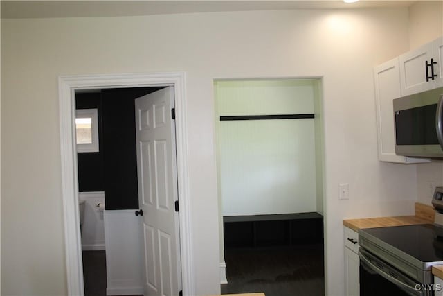 8766 N Main St, Le Ray, NY 13637 - kitchen featuring stainless steel appliances and white cabinets