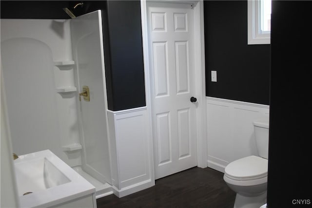8766 N Main St, Le Ray, NY 13637 - full bathroom with toilet, a shower, wainscoting, wood finished floors, and vanity