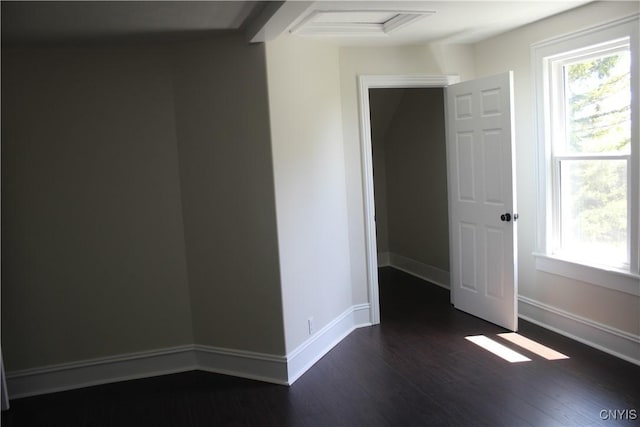 8766 N Main St, Le Ray, NY 13637 - empty room featuring healthy amount of natural light, dark wood-type flooring, and baseboards
