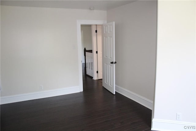 8766 N Main St, Le Ray, NY 13637 - spare room featuring dark wood finished floors and baseboards