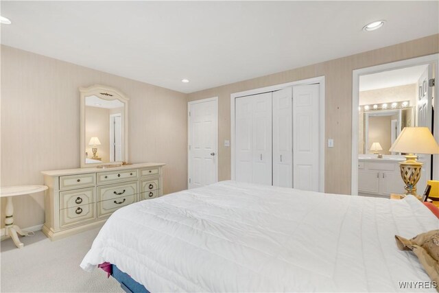 950 Hopkins Rd Unit B, Amherst, NY 14221 - bedroom with carpet flooring, a closet, recessed lighting, connected bathroom, and baseboards