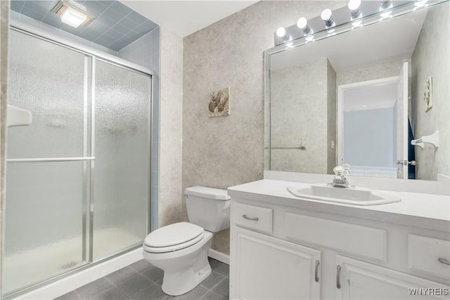 950 Hopkins Rd Unit B, Amherst, NY 14221 - bathroom with tile patterned floors, toilet, vanity, and a shower stall