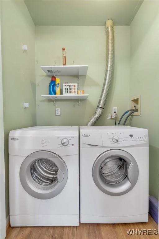 950 Hopkins Rd Unit B, Amherst, NY 14221 - laundry room with washer and clothes dryer and wood finished floors