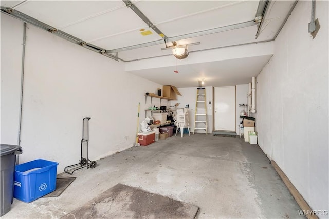 950 Hopkins Rd Unit B, Amherst, NY 14221 - garage with a garage door opener