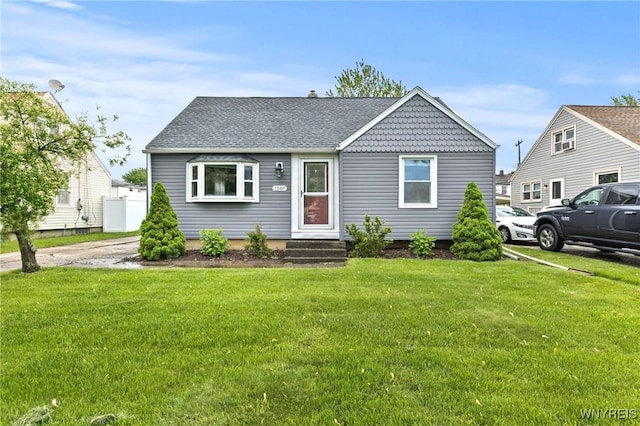 1587 Parker Blvd, Tonawanda-Town, NY 14150 - view of front of property with a front yard and roof with shingles