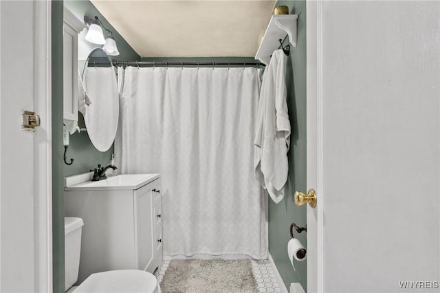 1587 Parker Blvd, Tonawanda-Town, NY 14150 - bathroom featuring vanity, toilet, a shower with shower curtain, and tile patterned flooring
