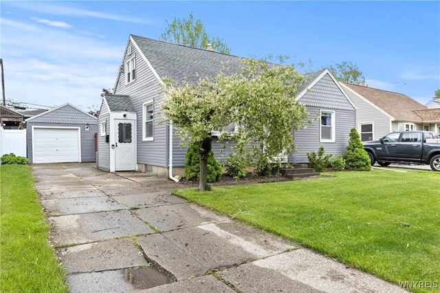 1587 Parker Blvd, Tonawanda-Town, NY 14150 - view of front of house featuring a front yard, a shingled roof, concrete driveway, and a garage