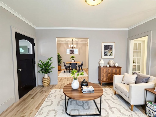 257 Haviland Park, Greece, NY 14616 - living room featuring light wood finished floors, ornamental molding, a chandelier, and baseboards