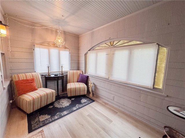 257 Haviland Park, Greece, NY 14616 - living area with wood finished floors, concrete block wall, and wood ceiling