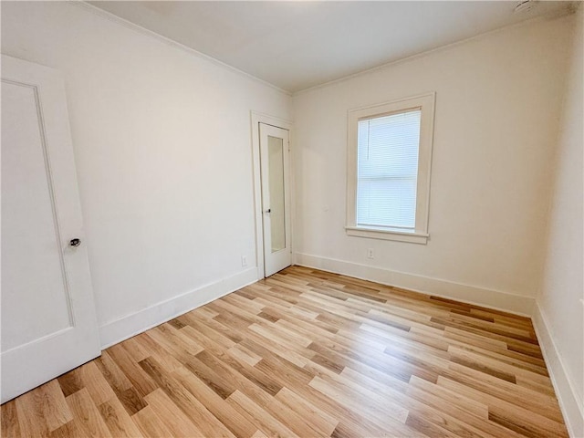 257 Haviland Park, Greece, NY 14616 - empty room featuring light wood-style flooring, crown molding, and baseboards