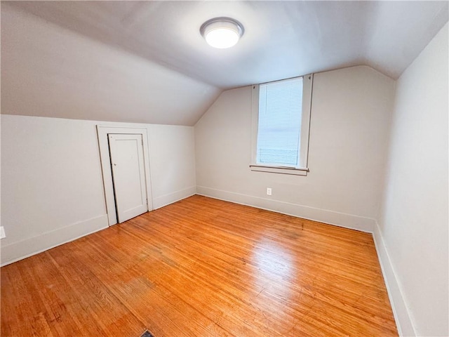257 Haviland Park, Greece, NY 14616 - bonus room featuring light wood finished floors, vaulted ceiling, and baseboards