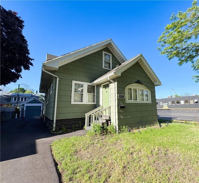 257 Haviland Park, Greece, NY 14616 - view of front of home featuring an outbuilding