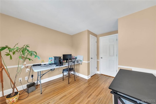 8918 Hurlburt Ln, Clarence, NY 14031 - home office with light wood-style floors and baseboards