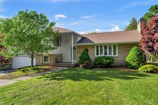 8918 Hurlburt Ln, Clarence, NY 14031 - split level home featuring stone siding, a front lawn, roof with shingles, a chimney, and a garage