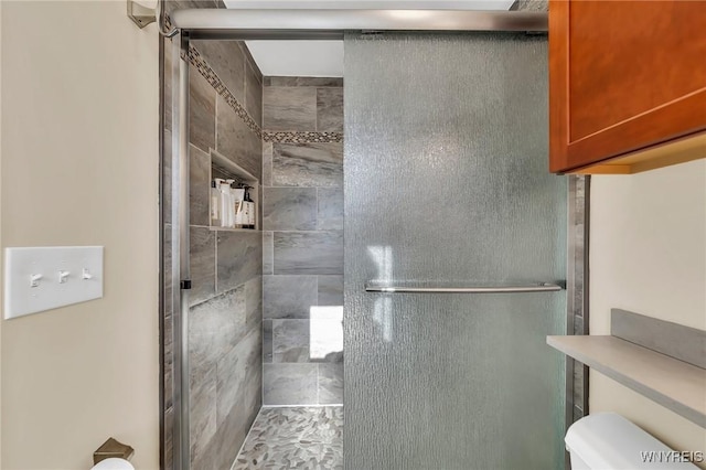 8918 Hurlburt Ln, Clarence, NY 14031 - full bathroom featuring a shower stall and toilet