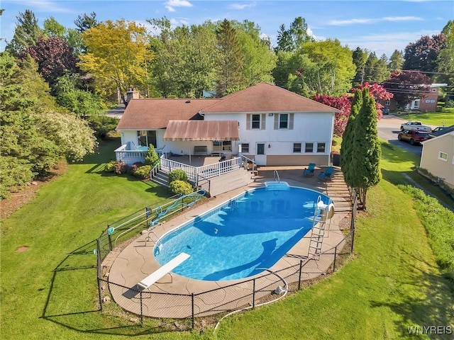 8918 Hurlburt Ln, Clarence, NY 14031 - swimming pool featuring a diving board, a deck, and a patio area