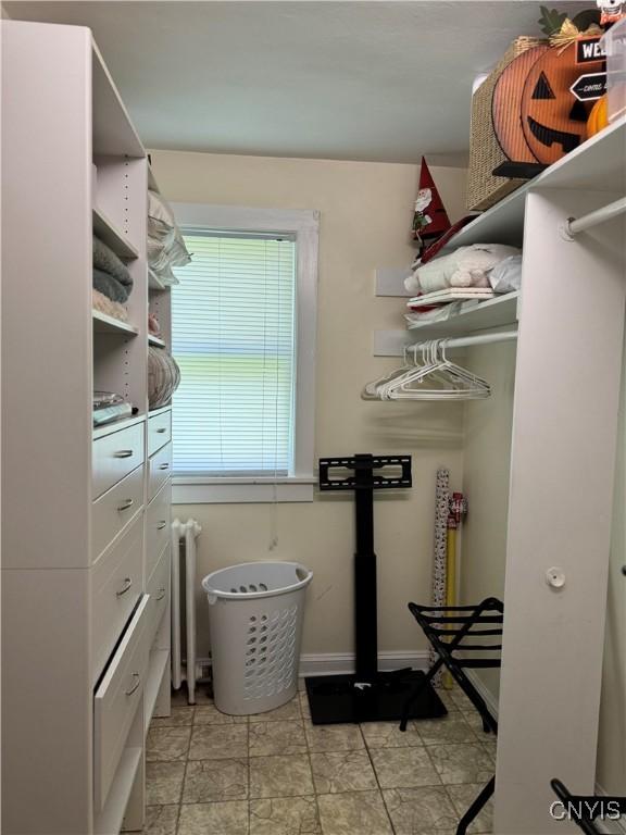 22 Hamilton St, Hamilton, NY 13346 - walk in closet featuring radiator heating unit