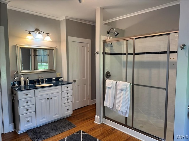 22 Hamilton St, Hamilton, NY 13346 - bathroom with a shower stall, crown molding, vanity, wood finished floors, and baseboards