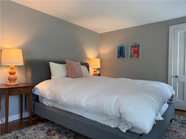 22 Hamilton St, Hamilton, NY 13346 - bedroom featuring wood finished floors and baseboards