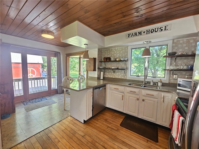 6207 Knickerbocker Rd, Ontario, NY 14519 - kitchen with stainless steel dishwasher, open shelves, a sink, wood ceiling, and stove