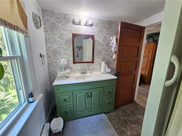 6207 Knickerbocker Rd, Ontario, NY 14519 - bathroom featuring vanity, tile patterned floors, and wallpapered walls