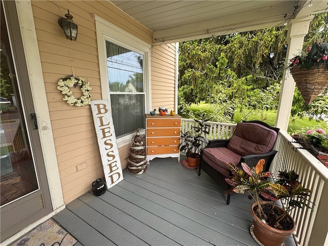 6207 Knickerbocker Rd, Ontario, NY 14519 - view of wooden porch