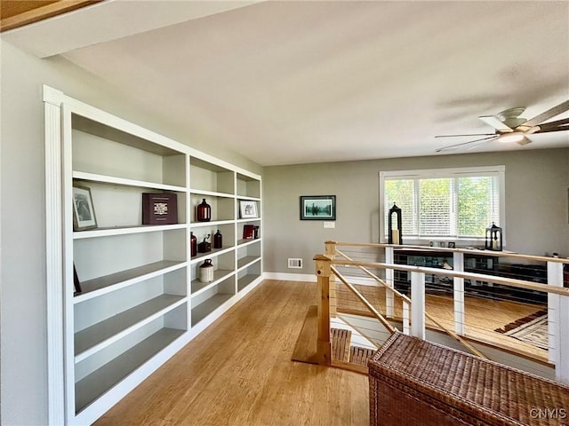 2 Perch Bay Rd, Morristown, NY 13669 - hallway featuring an upstairs landing, light wood-style flooring, and baseboards
