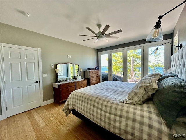 2 Perch Bay Rd, Morristown, NY 13669 - bedroom with access to exterior, french doors, light wood finished floors, baseboards, and a ceiling fan