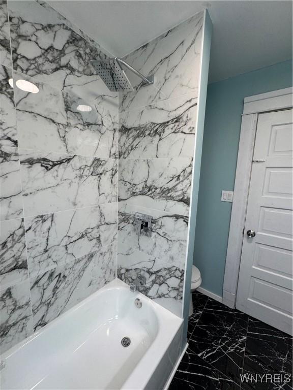 354 Schenck St, North Tonawanda, NY 14120 - full bath with shower / bathtub combination, toilet, and marble finish floors
