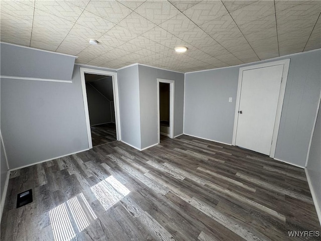 354 Schenck St, North Tonawanda, NY 14120 - unfurnished bedroom featuring wood finished floors, a closet, and baseboards