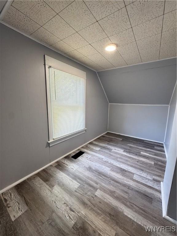 354 Schenck St, North Tonawanda, NY 14120 - bonus room featuring vaulted ceiling and wood finished floors