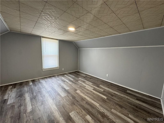 354 Schenck St, North Tonawanda, NY 14120 - bonus room featuring vaulted ceiling, wood finished floors, and baseboards