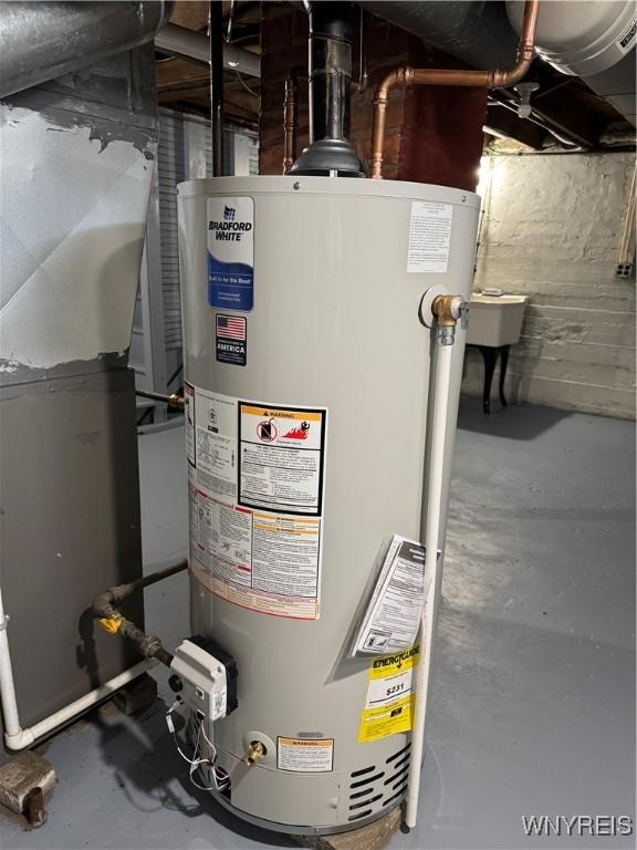 354 Schenck St, North Tonawanda, NY 14120 - utility room with water heater and heating unit