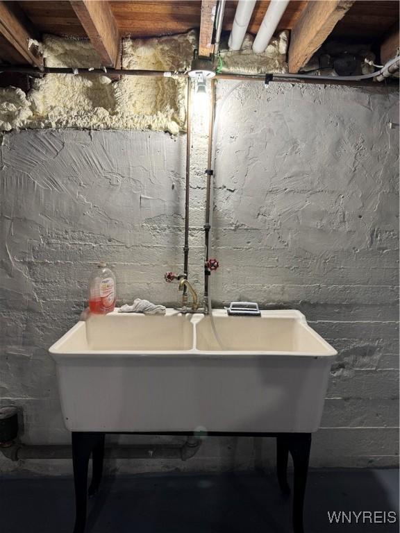 354 Schenck St, North Tonawanda, NY 14120 - unfinished below grade area featuring a sink
