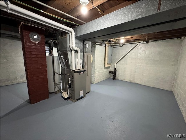 354 Schenck St, North Tonawanda, NY 14120 - unfinished below grade area featuring heating unit, gas water heater, and electric panel