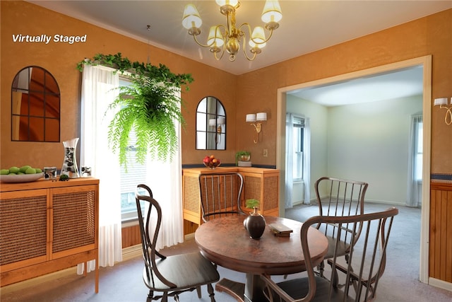 376 Imperial Ave, Erwin, NY 14870 - carpeted dining space with a chandelier, healthy amount of natural light, and baseboards