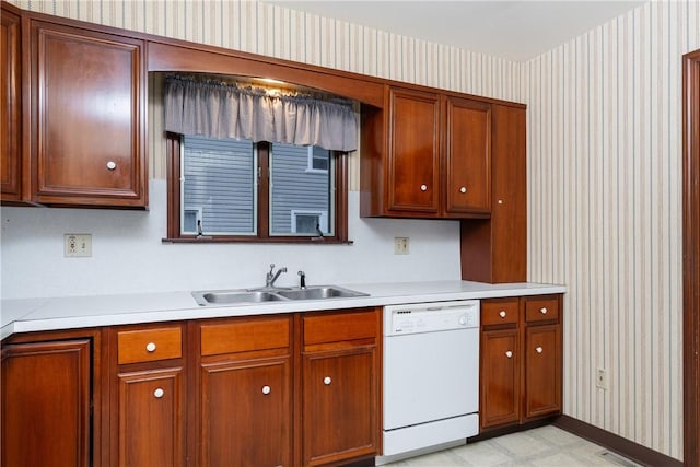 376 Imperial Ave, Erwin, NY 14870 - kitchen featuring white dishwasher, a sink, wallpapered walls, light countertops, and light floors