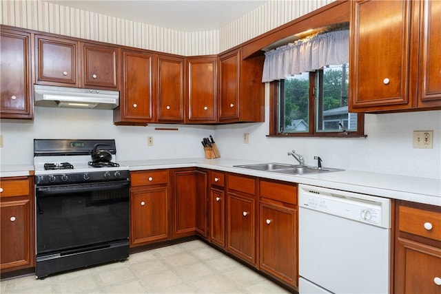 376 Imperial Ave, Erwin, NY 14870 - kitchen featuring under cabinet range hood, range with gas cooktop, dishwasher, a sink, and light countertops