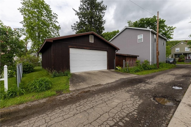 376 Imperial Ave, Erwin, NY 14870 - view of front of house with an outdoor structure, a garage, and asphalt driveway