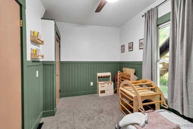 10652 Elm St, North Collins, NY 14111 - bedroom with wainscoting, carpet floors, and ceiling fan