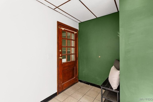 10652 Elm St, North Collins, NY 14111 - doorway featuring light tile patterned floors and baseboards